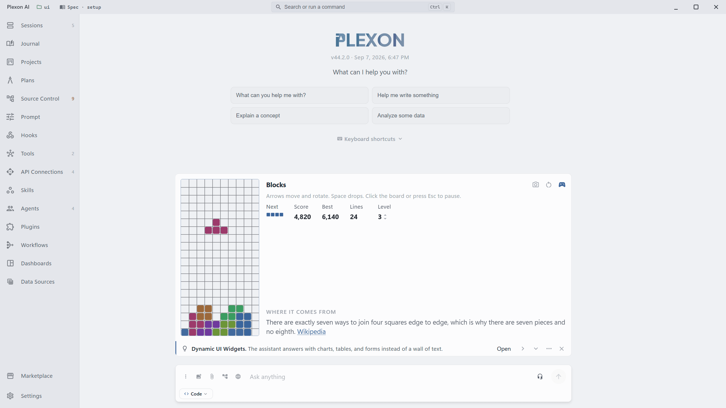 A game of Blocks playing inside the chat while a request runs, with its score, best, lines and level beside the board and a Where it comes from note underneath, and a Dynamic UI Widgets tip bar along the bottom.